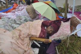Homeless people rest in a temporary settlement for the quake victims in Yongping township of Jinggu county in Yunnan province, China, 08 October 2014. A 6.6-magnitude earthquake jolted Jinggu 07 October night, killing at least one person and injuring at least 324 people so far. Over 52,000 people have been relocated, according to the government. EPA/ZHANG YQ CHINA OUT