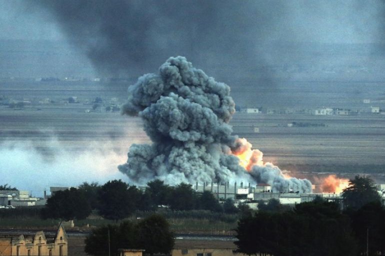 An explosion after an apparent airstrike by the international anti-Islamic State (IS) coalition on Kobane, Syria, as seen from the Turkish side of the border, near Suruc district, Sanliurfa, Turkey, 24 October 2014. According to reports fighters from the organisation calling itself the Islamic State has gained ground around the Syrian town of Kobane, taking and holding some of the higher ground to the west of the town and pushing back kurdish fighters, in the past few days, despite more than two weeks of coalition airstrikes and an airdrop of weapons and ammunition to the town's Kurdish defenders but according to both Turkish and Kurdish media a 1300 strong force has been authorised to support the Syrian Kurdish People's Defence Forces (YPG) who defend the town coming from the Kurdish north of Iraq.