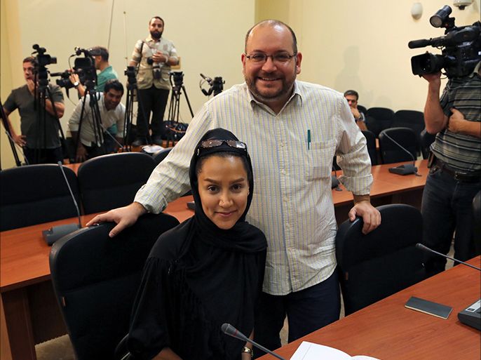 epa04330603 A picture made available on 25 July 2014 shows the Washington Post Iranian-American journalist Jason Rezaian (R) and his Iranian wife Yeganeh Salehi, who works for the UAE newspaper National, during a foreign ministry spokeswoman weekly press conference in Tehran, Iran, 10 September 2013. The Iranian judiciary has confirmed the arrest of two Iranian journalists, a photographer and her husband in Tehran. 'We are at the beginning of the investigation and therefore cannot announce any further details,' Tehran's judiciary chief Gholam Hussein Ismaeili told Mehr news agency on 25 July. Two of the arrested persons is the Iranian-American Jason Rezaian and his Iranian wife Yeganeh Salehi. EPA/STRINGER
