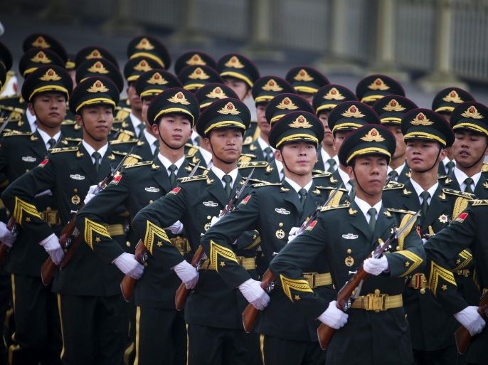 Members of China's Peoples Liberation Army (PLA) march out at the end of a welcoming ceremony for Romanian Prime Minister Victor Ponta hosted by Chinese Premier Li Keqiang (both not seen) at the Great Hall of the People in Beijing, China, 01 September 2014.