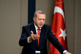 ANKARA, TURKEY - OCTOBER 22: Turkish President Recep Tayyip Erdogan makes a statement to the press before departing to Latvia for varied intercourses, at Esenboga International Airport in the capital Ankara, Turkey on October 22, 2014.