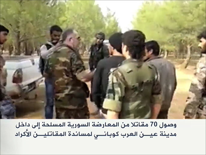 وصول 70 مقاتلا من المعارضة السوريةإلى عين العرب بقيادة العقيد العكيدي (الجزيرة)