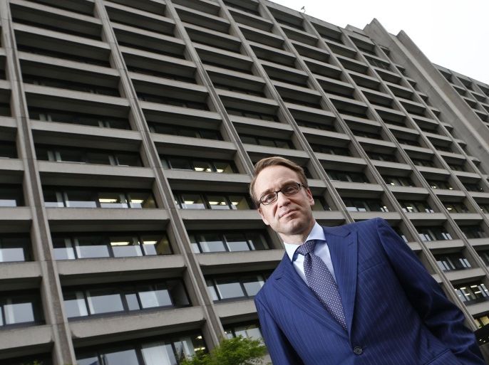 Germany's federal reserve Bundesbank President Jens Weidmann poses in front of the Bundesbank headquarters during a photo shoot with Reuters in Frankfurt May 17, 2013. REUTERS/Kai Pfaffenbach
