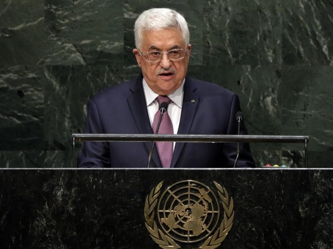 FILE - In this Friday, Sept. 26, 2014 file photo, President Mahmoud Abbas, of Palestine, addresses the 69th session of the United Nations General Assembly, at U.N. headquarters. In a pair of fiery speeches at the United Nations, the Israeli and Palestinian leaders appear to have abandoned any hope of reviving peace talks and instead seem intent on pressing forward with separate diplomatic initiatives that all but ignore each other. Both plans offer novel attempts at breaking months of deadlock, yet both appear doomed to fail. (AP Photo/Richard Drew, File)