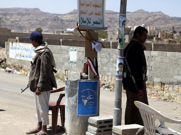SANAA, YEMEN - OCTOBER 18: A group of armed Houthi members wait in checkpoints in northern Sanaa, Yemen, on October 18, 2014.