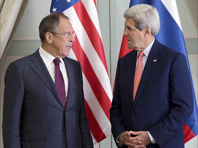 US Secretary of State John Kerry (R) speaks with Russian Foreign Minister Sergei Lavrov during a meeting at the Chief of Mission Residence in Paris on October 14, 2014. Kerry will lock horns with Lavrov on the crisis in Ukraine, as a week of high-stake talks get into full swing. AFP PHOTO/POOL/CAROLYN KASTER
