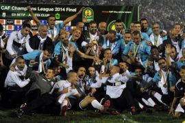 Algerian ES Setif team celebrate after winning the 2014 CAF Champions League, after the final match against the Congolese AS Vita Club in the Mustapha-Tchaker stadium in Blida, Algeria on 01 November 2014.