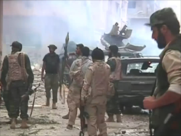 ‪‬ المواجهات بين قوات حفتر ومجلس ثوار بنغازي ما زالت مستمرة بالصابري(الجزيرة)