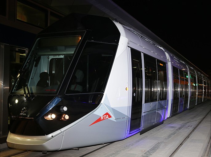 A handout picture released by the Media Office of Sheikh Mohammad Bin Rashid al-Maktoum, shows a new tram at a station on the opening night in Dubai on November 11, 2014. The Crown Prince of Dubai inaugurated the first phase of