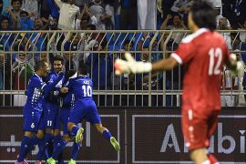 Kuwaiti players celebrate after scoring against Iraq during their Gulf Cup football match at the Prince Faisal bin Fahad stadium in Riyadh on November 14, 2014. Kuwait won 1-0. AFP PHOTO/ FAYEZ NURELDINE