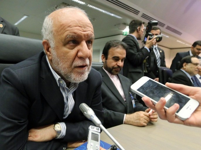 Iran's Bijan Namdar Zangeneh, Minister of Petroleum, speaks to journalists prior to the start of a meeting of the Organization of the Petroleum Exporting Countries, OPEC, at their headquarters in Vienna, Austria, Wednesday, June 11, 2014. OPEC oil ministers are heading into a meeting with apparent agreement to keep unchanged their output target of 30 million barrels a day. (AP Photo/Ronald Zak)