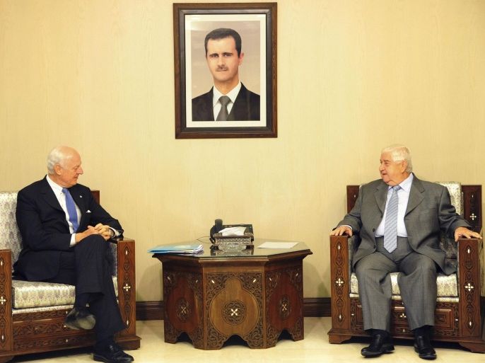 Syrian Foreign Minister Walid al-Moualem meets United Nations Envoy for Syria Staffan de Mistura (L) in Damascus November 9, 2014, in this picture released by Syria's national news agency SANA. REUTERS/SANA/Handout via Reuters (SYRIA - Tags: CIVIL UNREST POLITICS CONFLICT) ATTENTION EDITORS - THIS PICTURE WAS PROVIDED BY A THIRD PARTY. REUTERS IS UNABLE TO INDEPENDENTLY VERIFY THE AUTHENTICITY, CONTENT, LOCATION OR DATE OF THIS IMAGE. FOR EDITORIAL USE ONLY. NOT FOR SALE FOR MARKETING OR ADVERTISING CAMPAIGNS. THIS PICTURE IS DISTRIBUTED EXACTLY AS RECEIVED BY REUTERS, AS A SERVICE TO CLIENTS