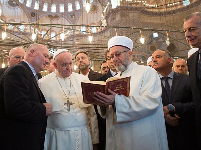 epa04508172 In this photo provided by Vatican newspaper L' Osservatore Romano, Pope Francis Pope Francis (L) is shown the Holy Quran by Mufti Rahmi Yaran during their visit to the Sultan Ahmed Mosque in Istanbul, 29 November 2014. The historic mosque - well known for its blue tiles adorning the interior walls - was built from 1609 till 1616. The pontiff concludes his visit 30 November when he will continue visiting key sites of the city's Byzantine and Ottoman heritage. EPA/OSSERVATORE ROMANO HANDOUT EDITORIAL USE ONLY/NO SALES
