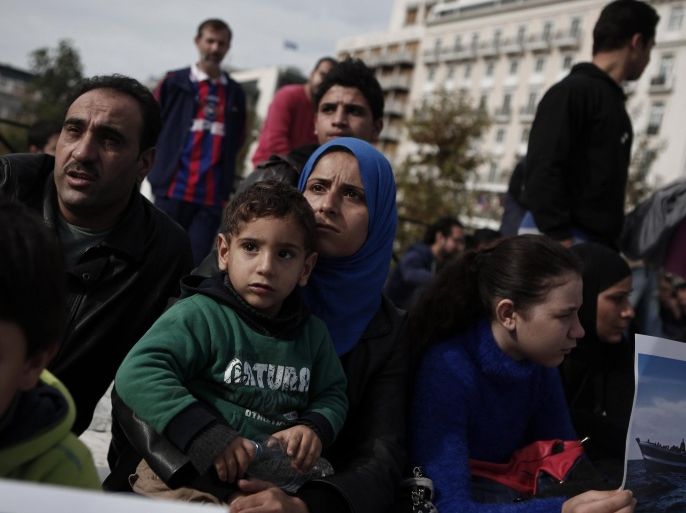 Syrian refugees take part in a rally in Athens November 19, 2014. More than 50 Syrian refugees staged a protest demanding that Greece grants them asylum. REUTERS/Alkis Konstantinidis (GREECE - Tags: POLITICS CONFLICT CIVIL UNREST)