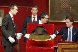 Napoleon's hat is set up prior to its auction in Fontainebleau, South of Paris, Sunday Nov. 16, 2014. Napoleon Bonaparte's famous bicorn hat was sold 1.5 million euros, $1,930,000. One of Napoleon Bonaparte's famous hats was among over 1,000 items relating to the French general that were auctioned near Paris this weekend. (AP Photo/Remy de la Mauviniere)