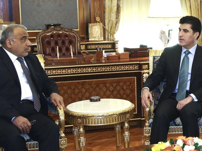 Iraq's Oil Minister, Adel Abdul-Mehdi (L) meets with Iraq's Kurdistan Prime Minister Nechirvan Barzani in Arbil, north of Baghdad, November 13, 2014. REUTERS/Stringer (IRAQ - Tags: POLITICS ENERGY)