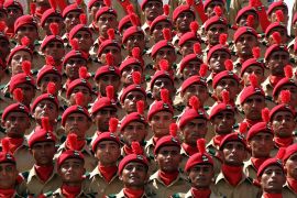 epa04418205 Pakistani Army recruits pose for a photograph during a passing out ceremony in Hyderabad, Pakistan, 26 September 2014. More than 500 of the Pakistani Army's Sindh regiment recruits attended the passing out ceremony.