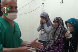 FILE - In this image taken from video obtained from the Shaam News Network, posted on April 18, 2014, an anti-Bashar Assad activist group, which has been authenticated based on its contents and other AP reporting, two women and a young girl are treated by a medic in Kfar Zeita, a rebel-held village in Hama province some 200 kilometers (125 miles) north of Damascus. A toxic chemical, almost certainly chlorine, was used "systematically and repeatedly" as a weapon in attacks on villages in northern Syria earlier this year, the global chemical weapons watchdog said Wednesday, Sept. 10, 2014. (AP Photo/Shaam News Network, File)