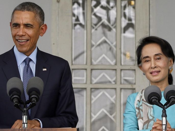US President Barack Obama (L) and Myanmar opposition leader Aung San Suu Kyi (R) hold a joint press conference at the Suu Kyi's resident in Yangon, Myanmar, 14 November 2014. US President Barack Obama is visiting Myanmar from 12 to 14 November 2014 as part of his six-days visit including China and Australia from November 10-16. During his second time visit to Myanmar, Obama attended the East Asia Summit (EAS), the US-ASEAN Summit and held a bilateral meeting with President Thein Sein in Naypyitaw.