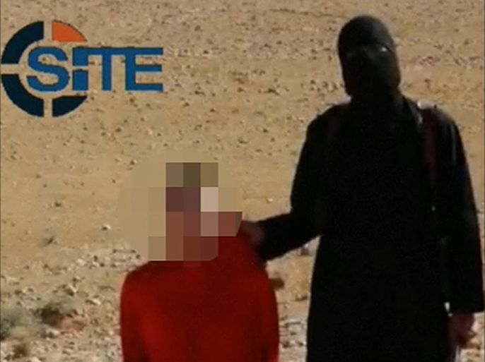 تنظيم الدولة يعرض فيديو اعدام رهينة أميركي