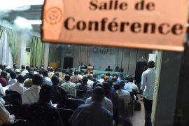 Politicians, local representatives, civilian representatives, religious, traditional and military leaders attend discussions to deal on the transition, on November 13, 2014 in Ouagadougou. Burkina Faso's army agreed on November 13 to a blueprint for a transition to civilian rule, almost two weeks after the ouster of the west African country's president Blaise Compaore. AFP PHOTO / ISSOUF SANOGO