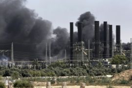Smoke rises from the Gaza power plant after it was hit by Israeli strikes, in the Nusseirat Refugee Camp, central Gaza Strip,Tuesday, July 29, 2014. Israel escalated its military campaign against Hamas on Tuesday, striking symbols of the group's control in Gaza and firing tank shells that shut down the strip's only power plant in the heaviest bombardment in the fighting so far. The plant’s shutdown was bound to lead to further serious disruptions of the flow of electricity and water to Gaza’s 1.7 million people. (AP Photo/Adel Hana)