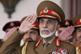 Oman's Sultan Qaboos bin Said salutes during the military parade in the capital Muscat, marking the Sultanates 43th National Day, on November 18, 2013. AFP PHOTO/MOHAMMED MAHJOUB