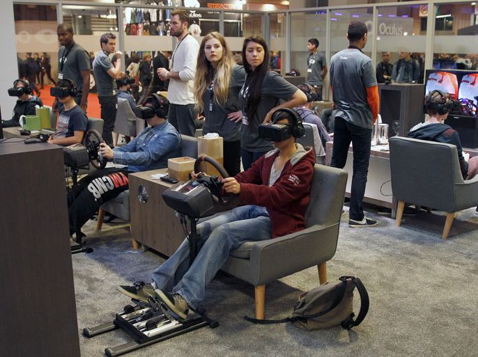 PARIS, FRANCE - OCTOBER 29: A gamer plays a game with the virtual reality head-mounted display 'Oculus Rift' during the International Games Week on October 29, 2014 in Paris, France. The display transfers the eye movements to the game in real time. International Games Week Paris takes place from October 29 till November 02, 2014.
