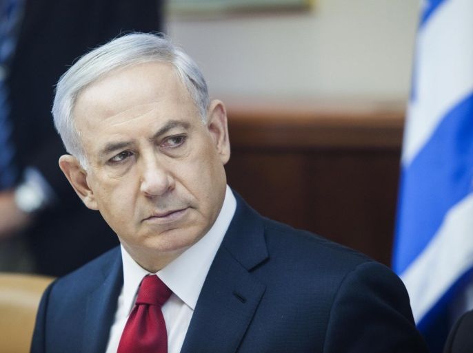 Israeli Prime Minister Benjamin Netanyahu attends the weekly cabinet meeting in his Jerusalem office on November 9, 2014. AFP PHOTO/POOL/DAN BALILTY