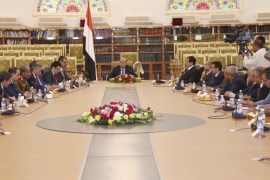 Yemen's President Abd-Rabbu Mansour Hadi (C) meets with the country's newly appointed cabinet after it was sworn-in at the Presidential Palace in Sanaa in this November 9, 2014 handout photo released by the country's Defence Ministry. REUTERS/Yemen's Defence Ministry/Handout via Reuters (YEMEN - Tags: POLITICS) NO SALES. NO ARCHIVES. FOR EDITORIAL USE ONLY. NOT FOR SALE FOR MARKETING OR ADVERTISING CAMPAIGNS. THIS IMAGE HAS BEEN SUPPLIED BY A THIRD PARTY. IT IS DISTRIBUTED, EXACTLY AS RECEIVED BY REUTERS, AS A SERVICE TO CLIENTS. REUTERS IS�UNABLE�TO INDEPENDENTLY VERIFY�THE AUTHENTICITY, CONTENT, LOCATION OR DATE OF THIS IMAGE.�