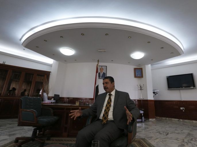 Yemen's envoy to the United Nations Khaled Bahah talks during an interview with Reuters in Sanaa in this May 21, 2014 file photo. The Yemeni president on Monday appointed Bahah as prime minister, an aide said, in a move that may help ease a political crisis after the Houthi Shi'ite Muslim group captured Sanaa last month. Picture taken on May 21, 2014. REUTERS/Khaled Abdullah/Files (YEMEN - Tags: POLITICS CIVIL UNREST)