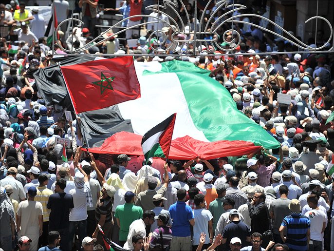 مسيرة سابقة في المغرب للتضامن مع فلسطين والتنديد بالتطبيع (الجزيرة نت)