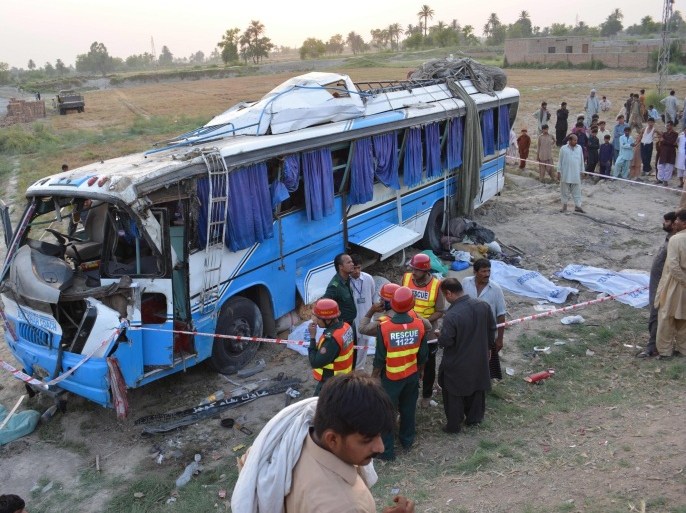 Rescue workers recover the bodies of the victims of a bus accident in Dera Ghazi Khan, Pakistan, 29 May 2014. At least six passengers were killed when a bus overturned after a collision with a van in Dera Ghazi Khan. Pakistan has one of the world's worst records for fatal traffic accidents, blamed on poor roads, badly maintained vehicles and reckless driving.