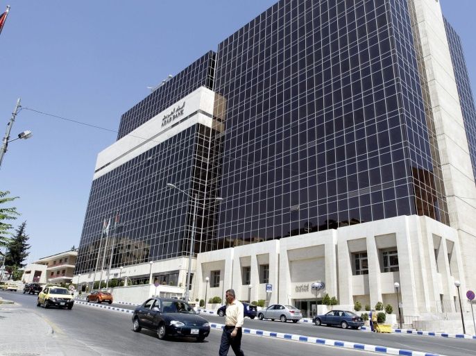 A picture taken on August 16, 2014 shows the Arab Bank's main offices in the Jordanian capital, Amman. Jordan's Arab Bank went on trial on August 15, 2014 in New York accused of aiding terror by transferring support funds to the families of Palestinians who died in the conflict with Israel. The families of several Americans killed in early 2000s attacks by the Islamic movement Hamas said the bank, which has a New York branch, was in violation of the 2001 Anti-Terrorism Act when it served as a conduit for the money from a Saudi Arabian fund to the Palestinian families. AFP PHOTO/KHALIL MAZRAAWI