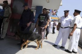 A canine unit inspects the area of a blast in Shubra El-Kheyma metro station in Greater Cairo, June 25, 2014. Four small bomb blasts wounded at least five people in Cairo during the morning rush hour on Wednesday, security sources said, the first such casualties in the capital since Abdel Fattah al-Sisi became president this month. REUTERS/Mohamed Abd El Ghany (EGYPT - Tags: POLITICS CIVIL UNREST)
