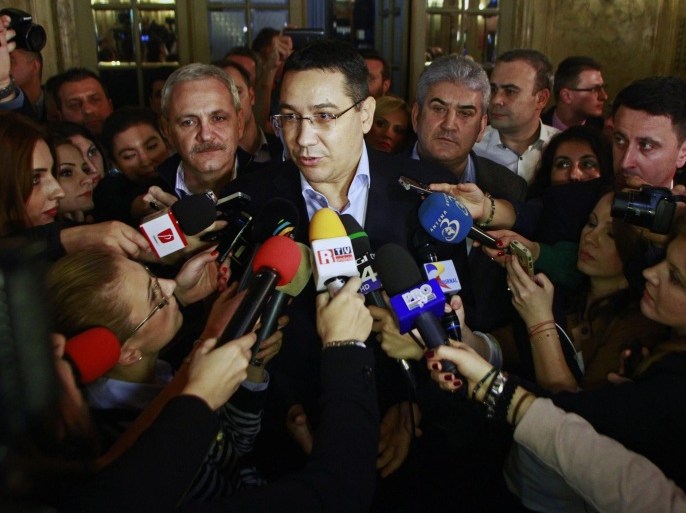 Romania's Prime Minister and presidential candidate Victor Ponta speaks to the media after exit-polls in Bucharest November 16, 2014. Ponta conceded defeat in the presidential election on Sunday, although exit polls had shown an unclear result and the first results were not due for release until 0000 GMT. Ponta had comfortably beaten his opponent, centre-right mayor Klaus Iohannis, in the first round on Nov 2, and led opinion polls ahead of Sunday's vote. REUTERS/Gabriel Petrescu (ROMANIA - Tags: POLITICS ELECTIONS)