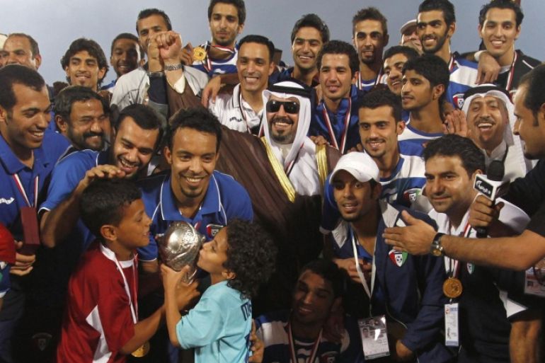 Kuwait National Team players celebrate winning the Gulf Cup final soccer match against Saudi Arabia in Aden December 5, 2010.