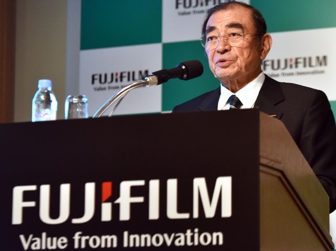 Japan's Fujifilm Holdings chairman and CEO Shigetaka Komori announces the company's three-year business strategy in Tokyo on November 11, 2014 as the imaging company expands its health care business sector. Fujifilm said the company's Avigan anti-influenza drug would be formally approved by WHO early next year for treating patients infected with the Ebola virus. AFP PHOTO / Yoshikazu TSUNO