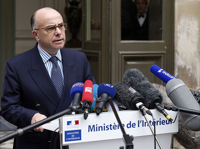 French Interior Minister Bernard Cazeneuve holds a press conference in Paris, on November 17, 2014. Cazeneuve said today there was a "strong possibility" one of the Islamic State jihadists seen unmasked in a video purporting to show the execution of a US aid worker and Syrian soldiers was a French citizen. "There is a strong possibility that a French citizen was directly involved" in the beheading of at least 18 Syrian men, shown in the gruesome video on Sunday that also claimed the murder of American Peter Kassig, said Cazeneuve. AFP PHOTO / THOMAS SAMSON
