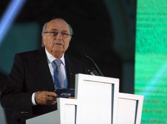 FIFA President Joseph Blatter speaks during a ceremony held at the Saudi Football Federation on the night of the 22nd Gulf Cup football tournament in Riyadh on November 13, 2014. Eight nations are taking part in the games including Oman, UAE, Kuwait, Yemen, Bahrain, Iraq, Saudi Arabia and Qatar. AFP PHOTO/ STR