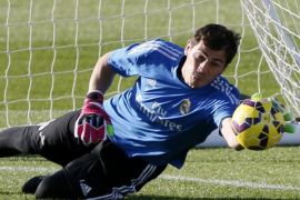 Real Madrid's Spanish goalkeeper Iker Casillas saves a ball during the team's training session in Valdebebas sports complex near Madrid city, central Spain, 31 October 2014. Real Madrid will face Granada in a Spanish Liga's Primera Division match on 01 November.