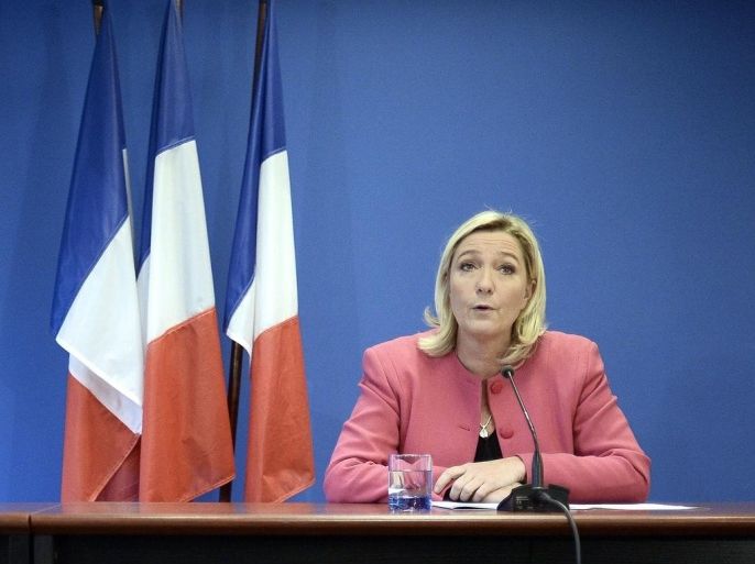 French far-right National Front (FN) party's President Marine Le Pen gives a press conference at the FN headquarters in Nanterre on October 15, 2014. AFP PHOTO / STEPHANE DE SAKUTIN