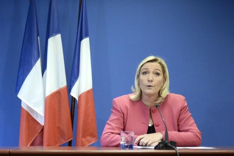 French far-right National Front (FN) party's President Marine Le Pen gives a press conference at the FN headquarters in Nanterre on October 15, 2014. AFP PHOTO / STEPHANE DE SAKUTIN