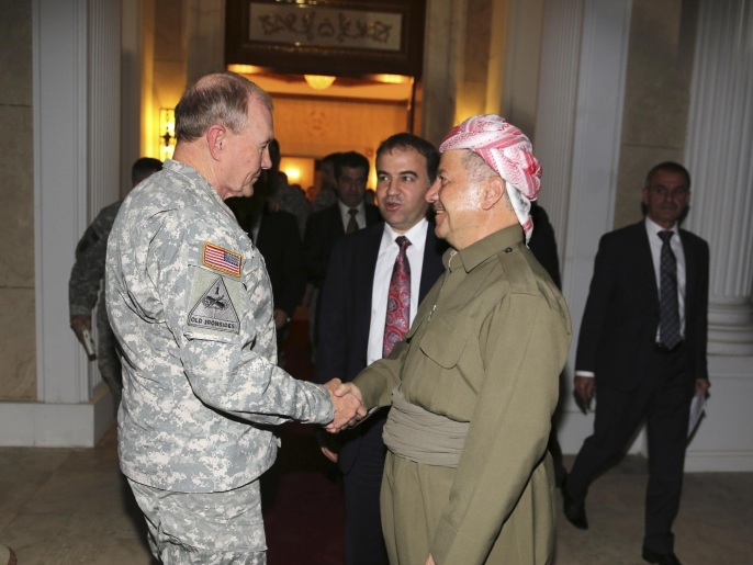 ديمبسي (يسار) التقى البارزاني في أربيلوبحث معه محاربة تنظيم الدولة (رويترز)