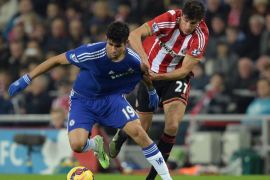 Sunderland's Santiago Vergini (R) challenges Chelsea's Diego Costa during the English Premier League soccer match between Sunderland and Chelsea at the Stadium of Light, Sunderland, Britain, 29 November 2014. EPA/NIGEL RODDIS http://www.epa.eu/files/TermsandConditions/DataCo_Terms_and_Conditions.pdf