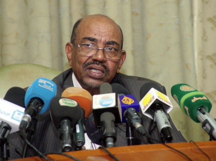 Sudanese President Omar al-Bashir speaks during a press conference on November 30, 2014 in the capital Khartoum. Bashir called for a 'clear programme' for the UN-African Union mission in Darfur to leave, saying the peacekeepers had become a 'burden'. The government is locked in a dispute with UNAMID over its investigation of reports Sudanese troops raped 200 women and girls in a Darfur village in October. AFP PHOTO/STR
