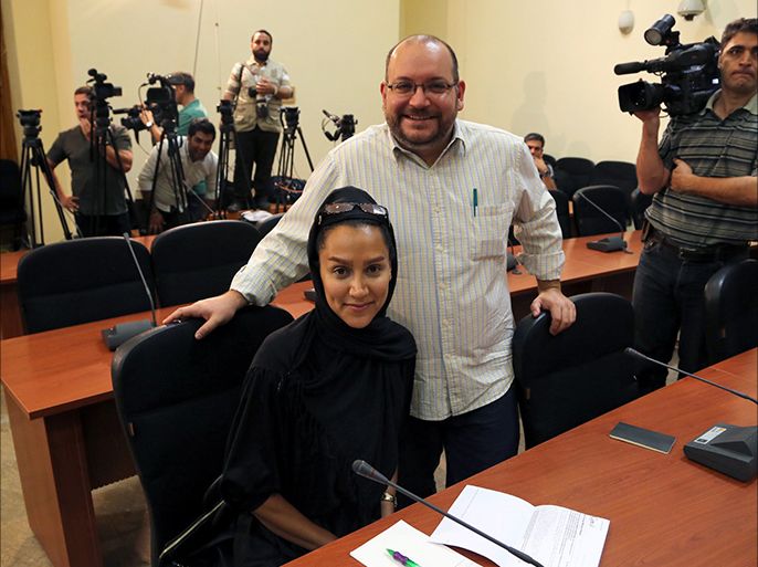 epa04330603 A picture made available on 25 July 2014 shows the Washington Post Iranian-American journalist Jason Rezaian (R) and his Iranian wife Yeganeh Salehi, who works for the UAE newspaper National, during a foreign ministry