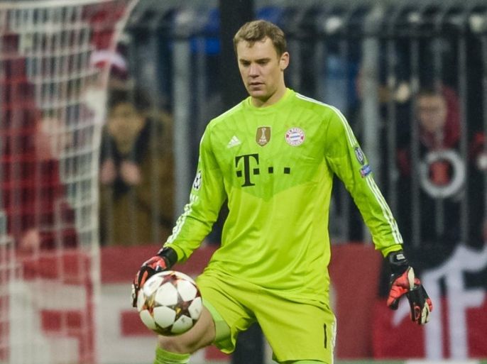Bayern Munich's German keeper Manuel Neuer in action during the UEFA Champions League Group E second-leg football match FC Bayern Munich vs CSKA Moscow in Munich, southern Germany, on December 10, 2014. AFP PHOTO / GUENTER SCHIFFMANN