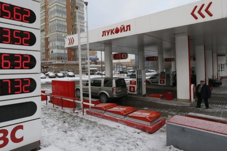 Diesel and petrol prices are displayed on a board at an LUKOIL gas station in Moscow, Russia, 02 December 2014. Oil prices tumbled to an over five-year low on Monday sending the Russian rouble into freefall and placing renewed pressure on European energy stocks. Russia's heavy reliance on oil as an export earner has turned the rouble into one of a major victims of collapsing oil prices, which have dropped by about 40 per cent since the start of the year. The rouble has lost about 37 per cent of its value against the dollar since the start of the year.