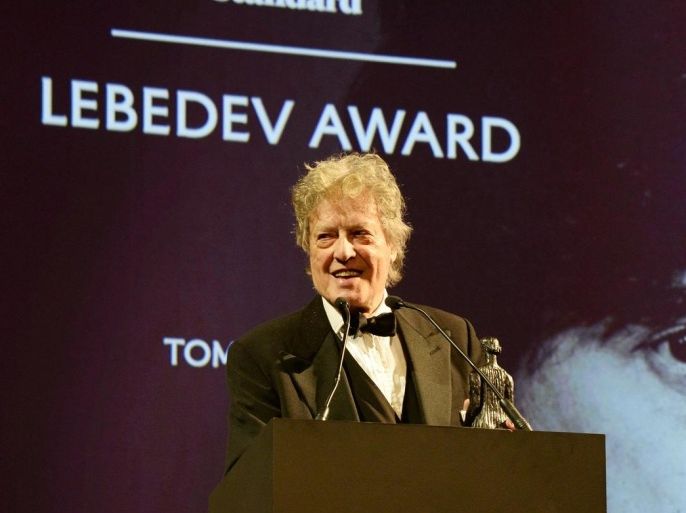 LONDON, ENGLAND - NOVEMBER 30: Sir Tom Stoppard accepts the Lebedev Award on stage at the 60th London Evening Standard Theatre Awards at the London Palladium on November 30, 2014 in London, England.